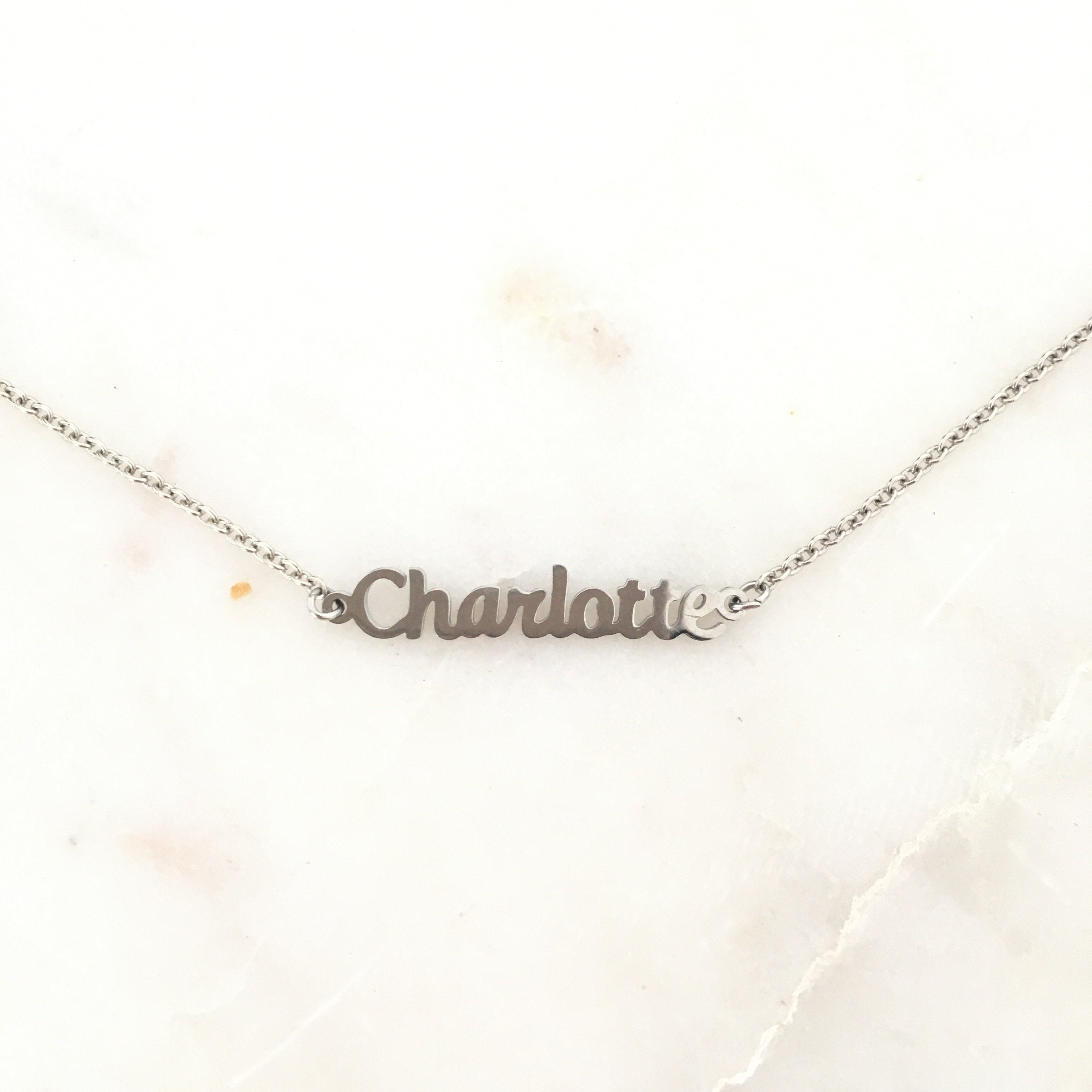 Necklace that deals spells your name